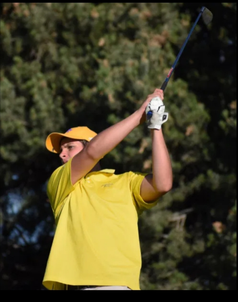 Emmett Loomis playing golf